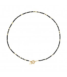 zwarte met goudkleurige halsketting met kralen,er is ook bijpassende armband bij.