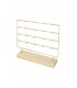 Sieradenrek met goudkleurig frame en een blank houten voet