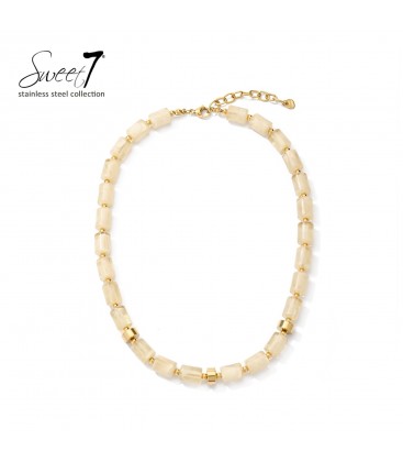 Halsketting beige stijlvolle kralenketting met goudkleurige details